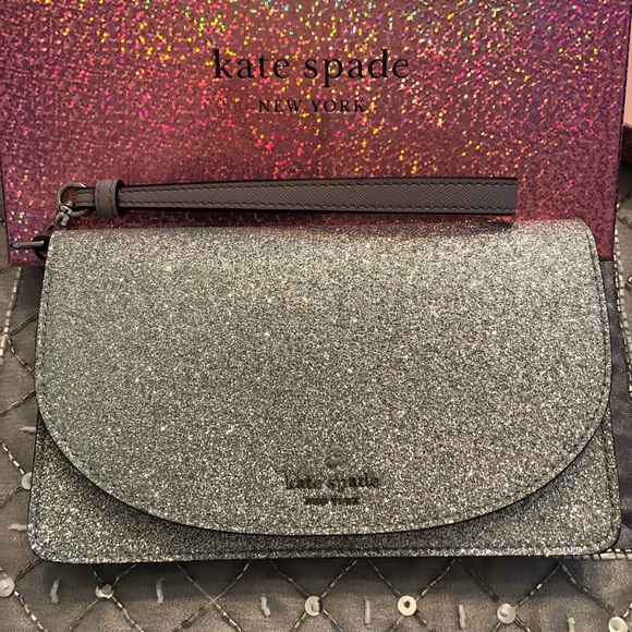 kate spade Handbags - Kate spade large wristlet clutch GLITTER SILVER